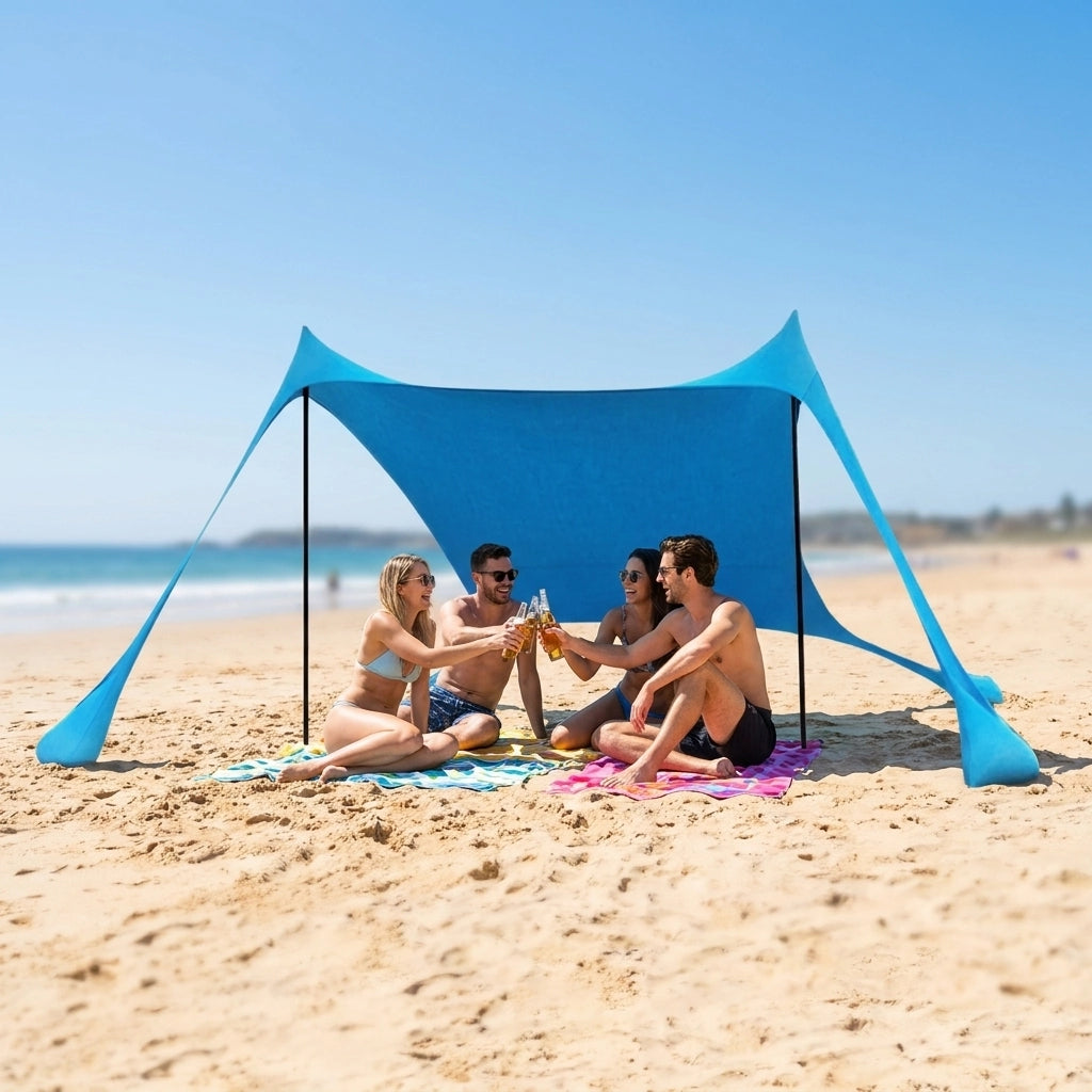 2 couples d'amis profitant de la plage grâce à la tente NomaSun